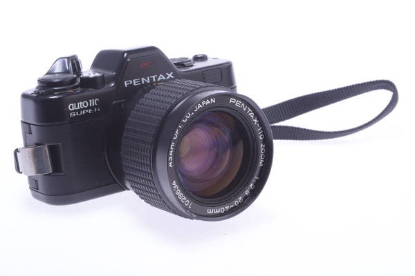 PENTAX 110 ZOOM 20-40MM 2.8 LENS W/ 110 SUPER AUTO CAMERA FOR PARTS OR REPAIR