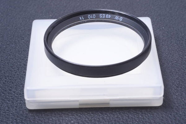 B & W SCHNEIDER UV 010 49MM FILTER GENUINE LENS OR CAMERA SCREW W/ KEEPER 23-3