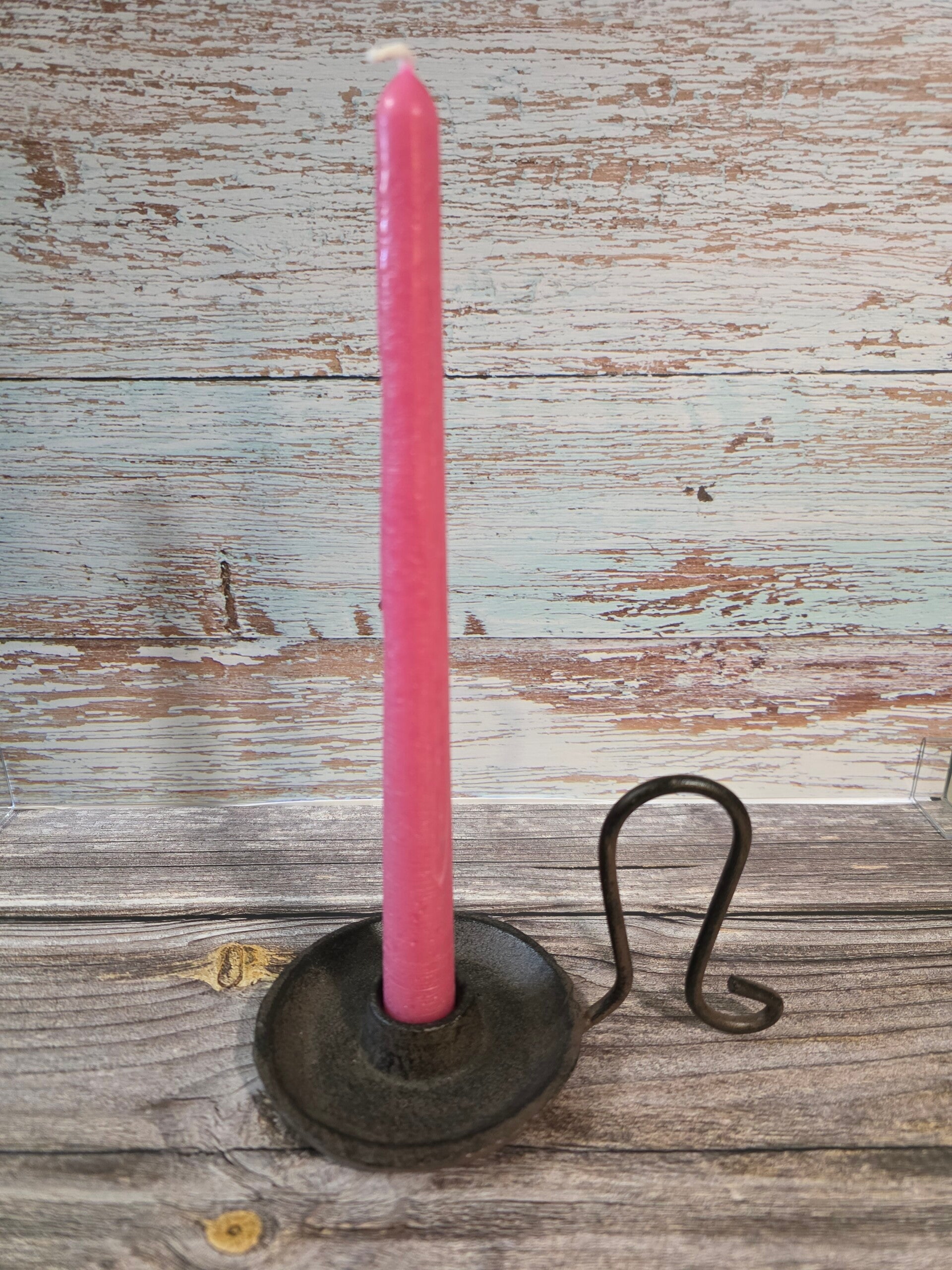 pink taper candle