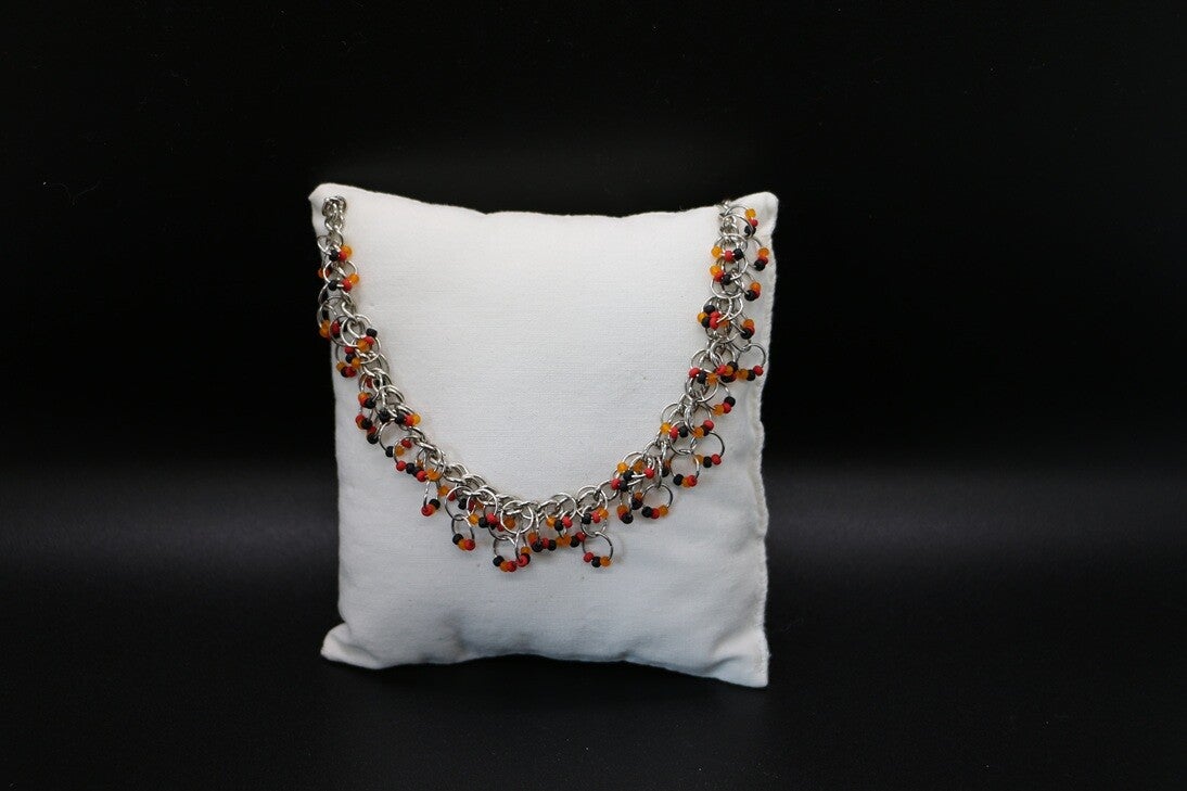 Armkette orange- schwarz