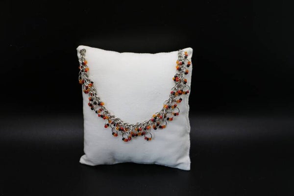 Armkette orange- schwarz