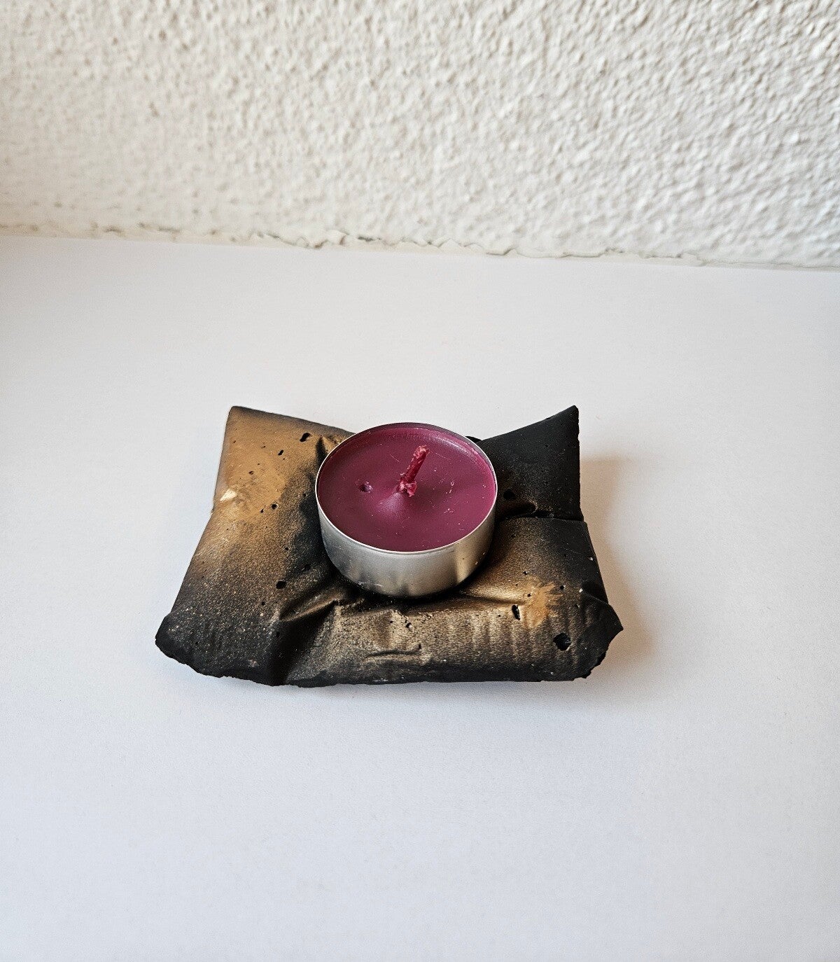 Kerzenkissen schwarz/gold