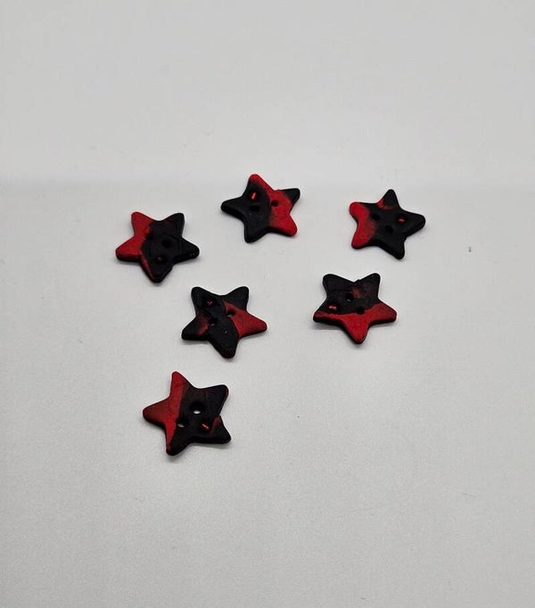 Knöpfe Sterne schwarz rot