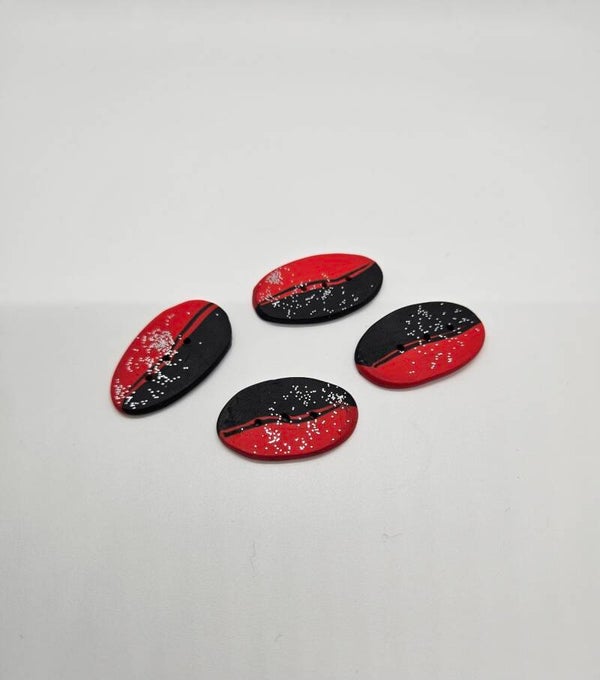 Knöpfe oval rot schwarz