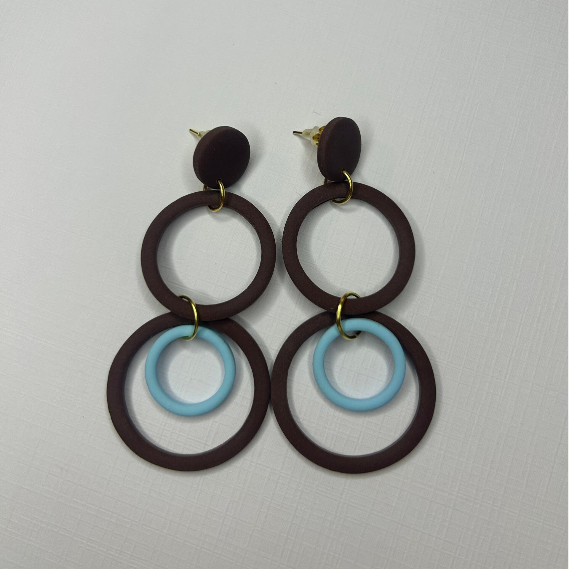 CANDELA Marrón Chocolate y Azul Pastel