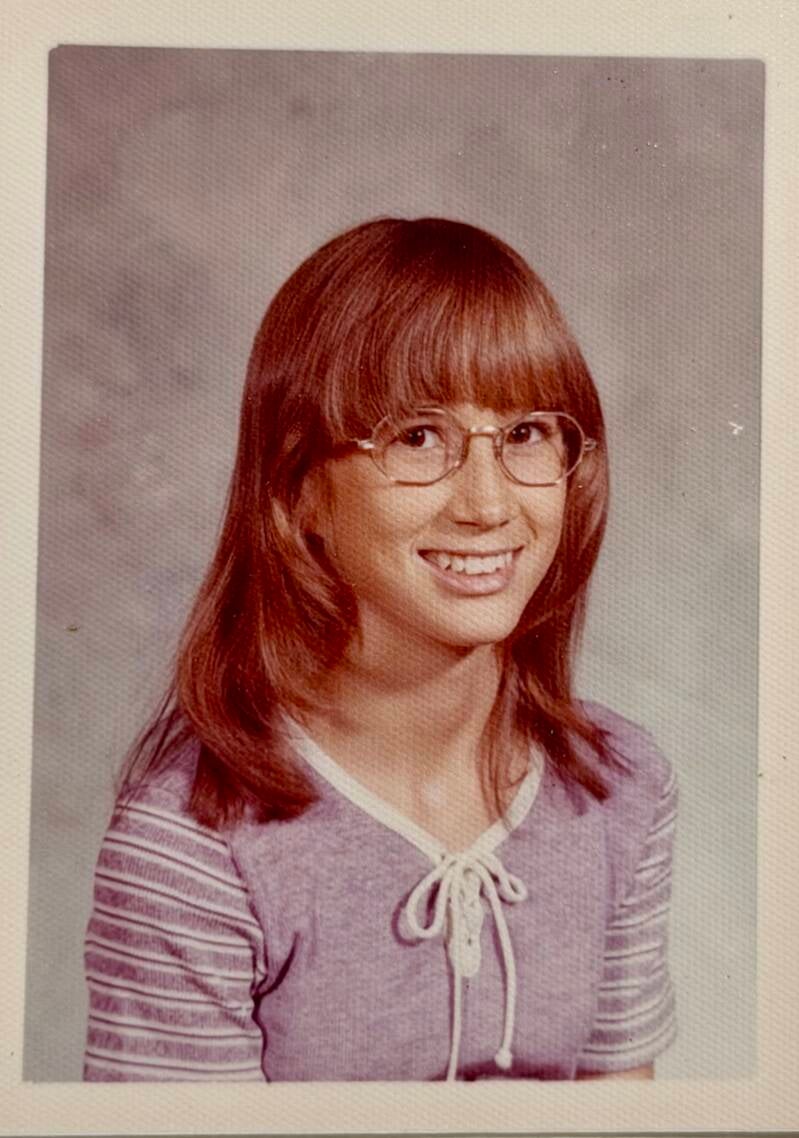 My fifth-grade class picture with my cute glasses. 