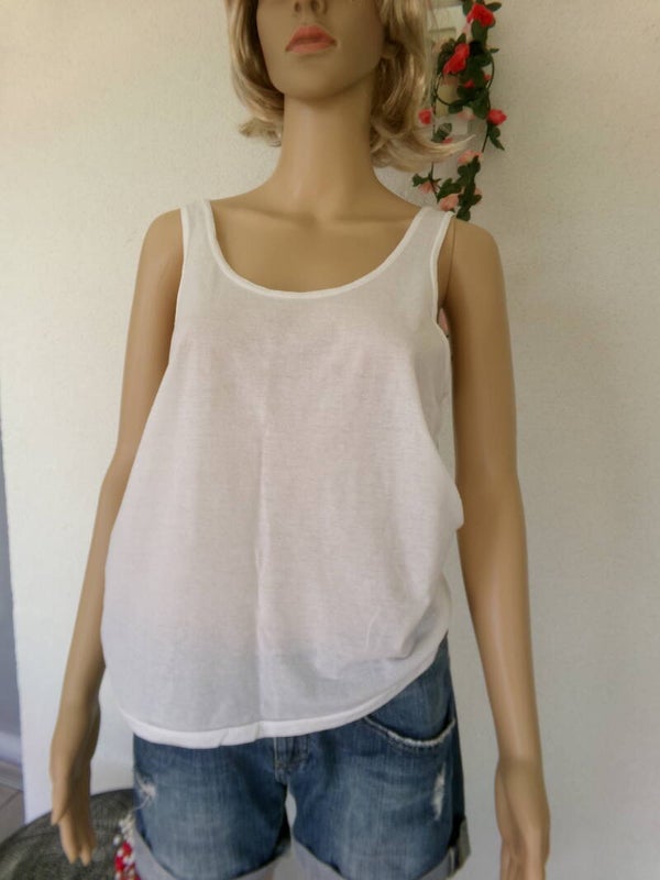 Haut sans manche écru matière extraordinaire légère Taille S/M Pimkie