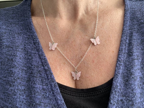 The pink butterfly necklace