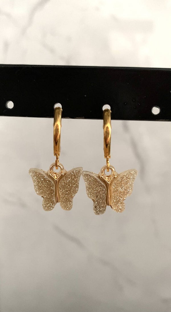 The gold butterfly earrings