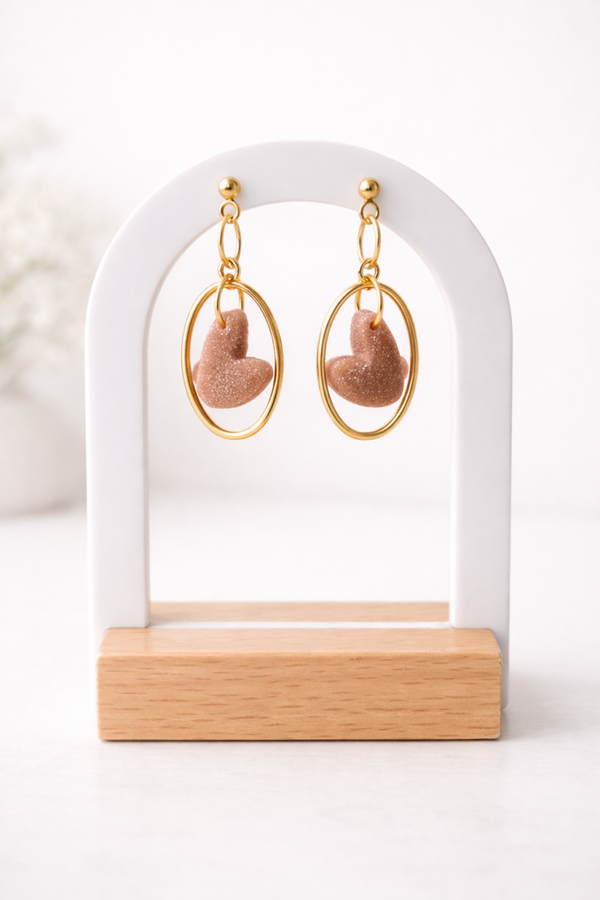 Rose gouden hartje met gouden rondje