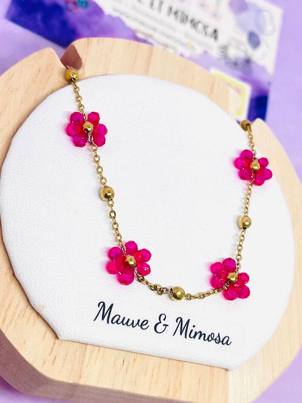Collier fleurs perlées fuchsia