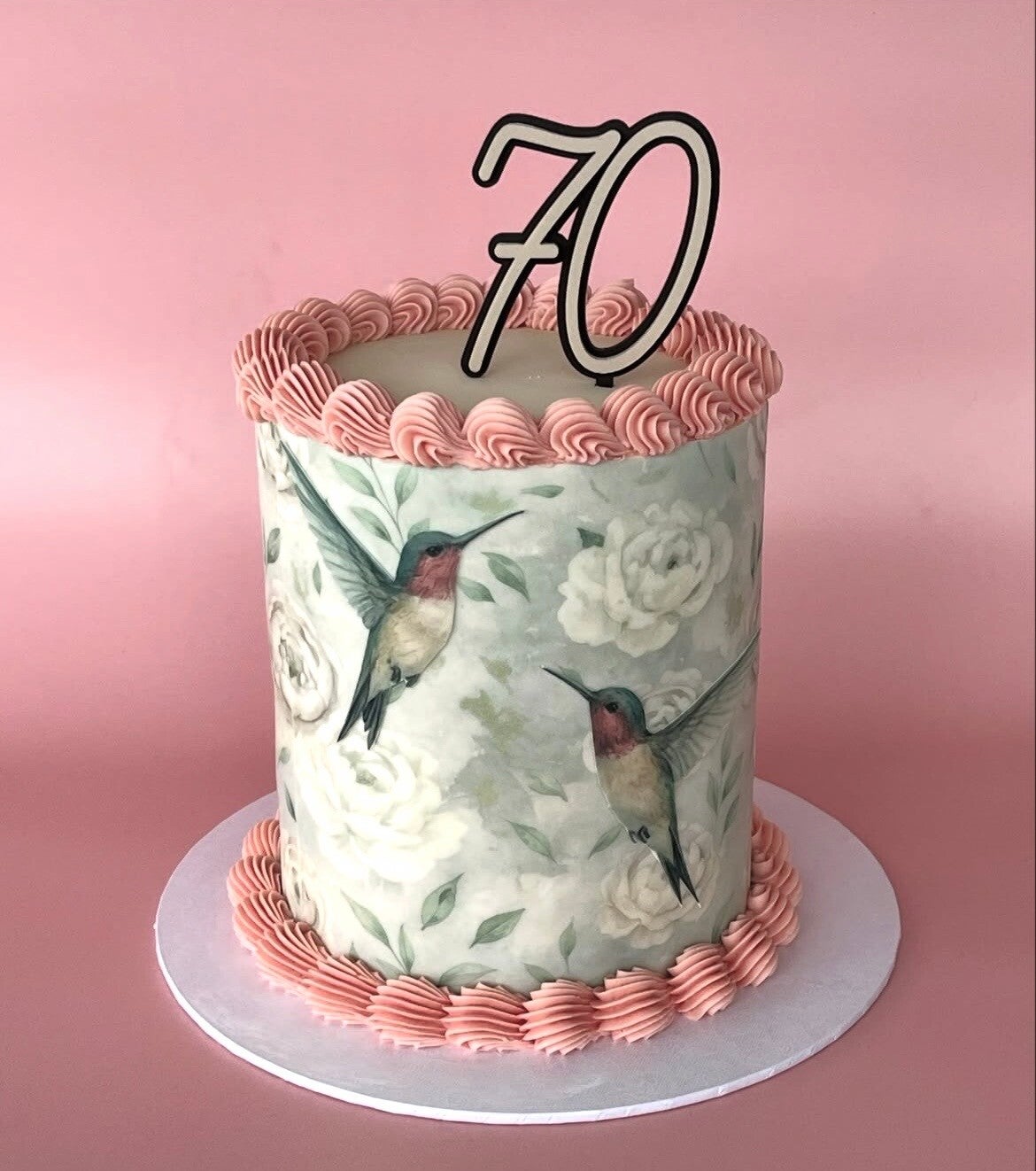 Celebration traybake Cocomelon  birthday, iced in swiss meringue buttercream pink decoration