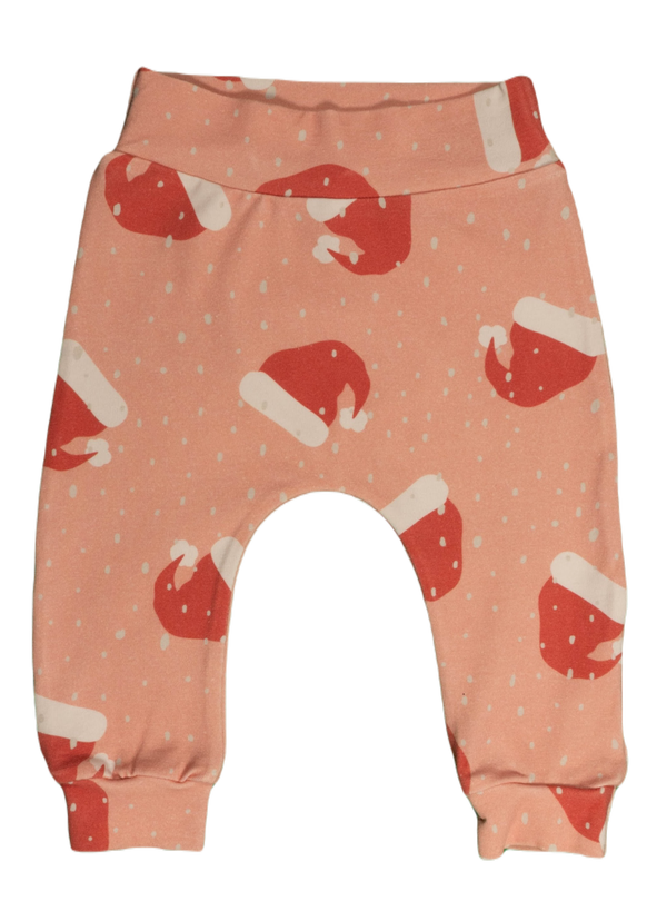 Babybroekje, harembroekje: Kerst - Kerstmuts op roze ondergrond.