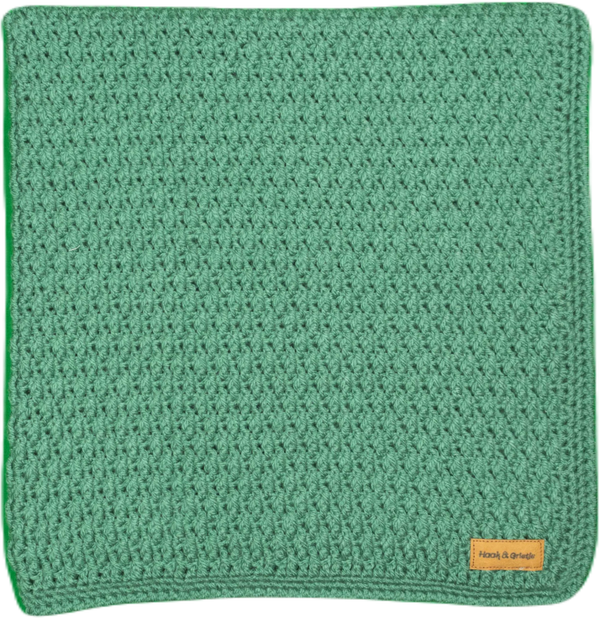 Effen deken, zachtgroen in reliëfsteek