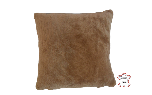 Coussin en peau d'agneau lainé beige doncé