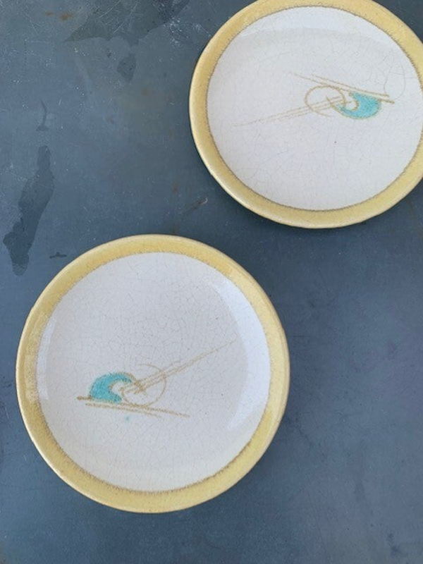 8 kleine bordjes, vermoedelijk Hildo Krop voor ESKAF