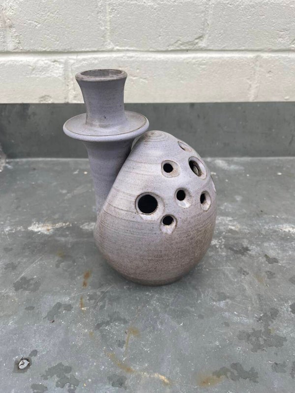 Ikebana en kaarsenhouder