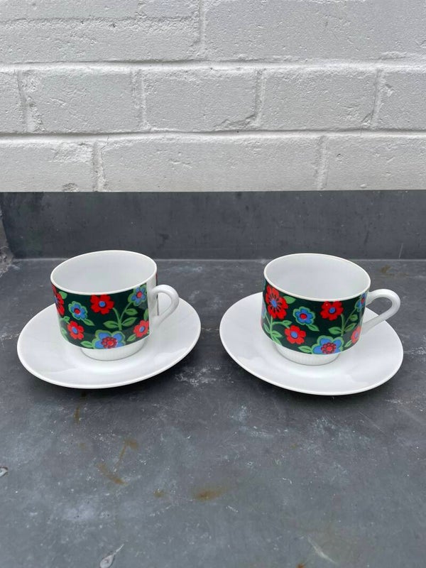 Set van twee kop en schotels