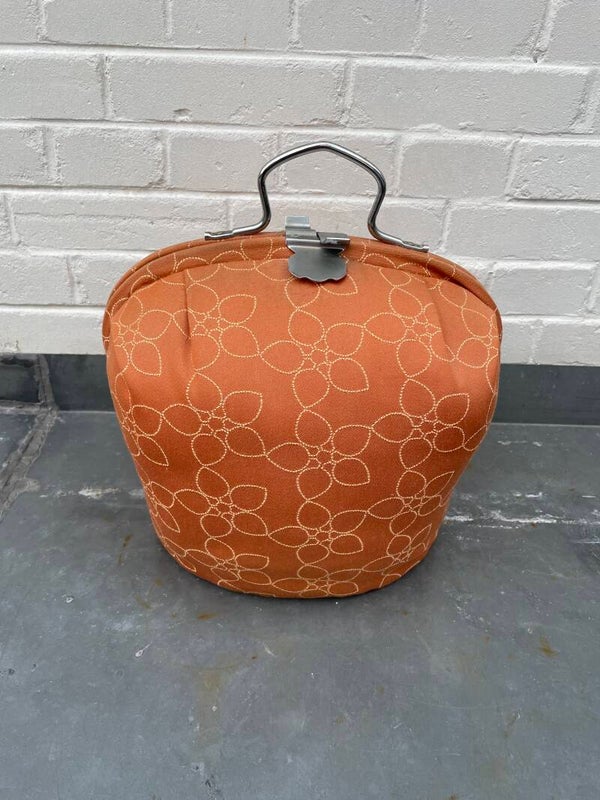 Vintage theemuts, TMI