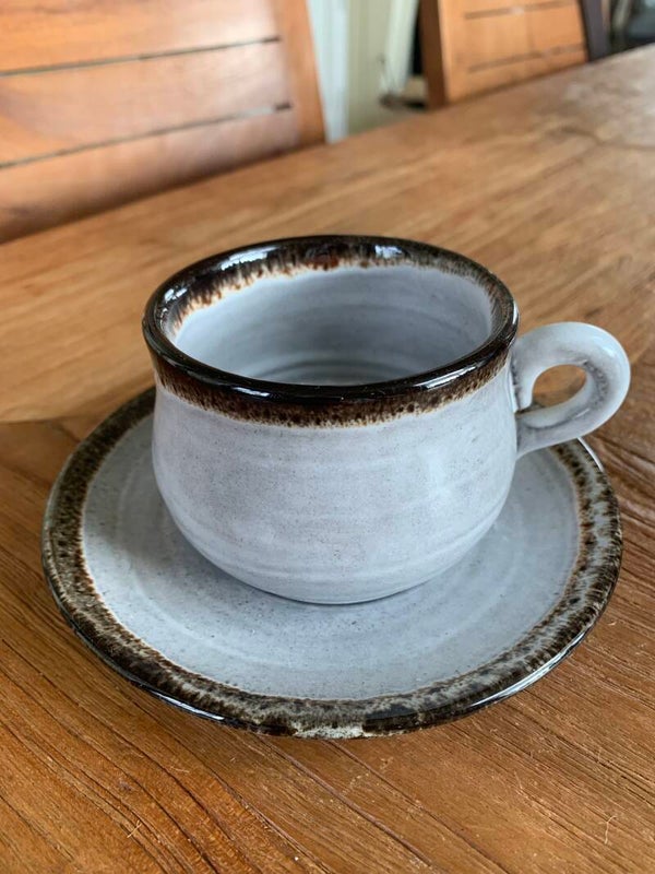 Kop en schotel Keramiek