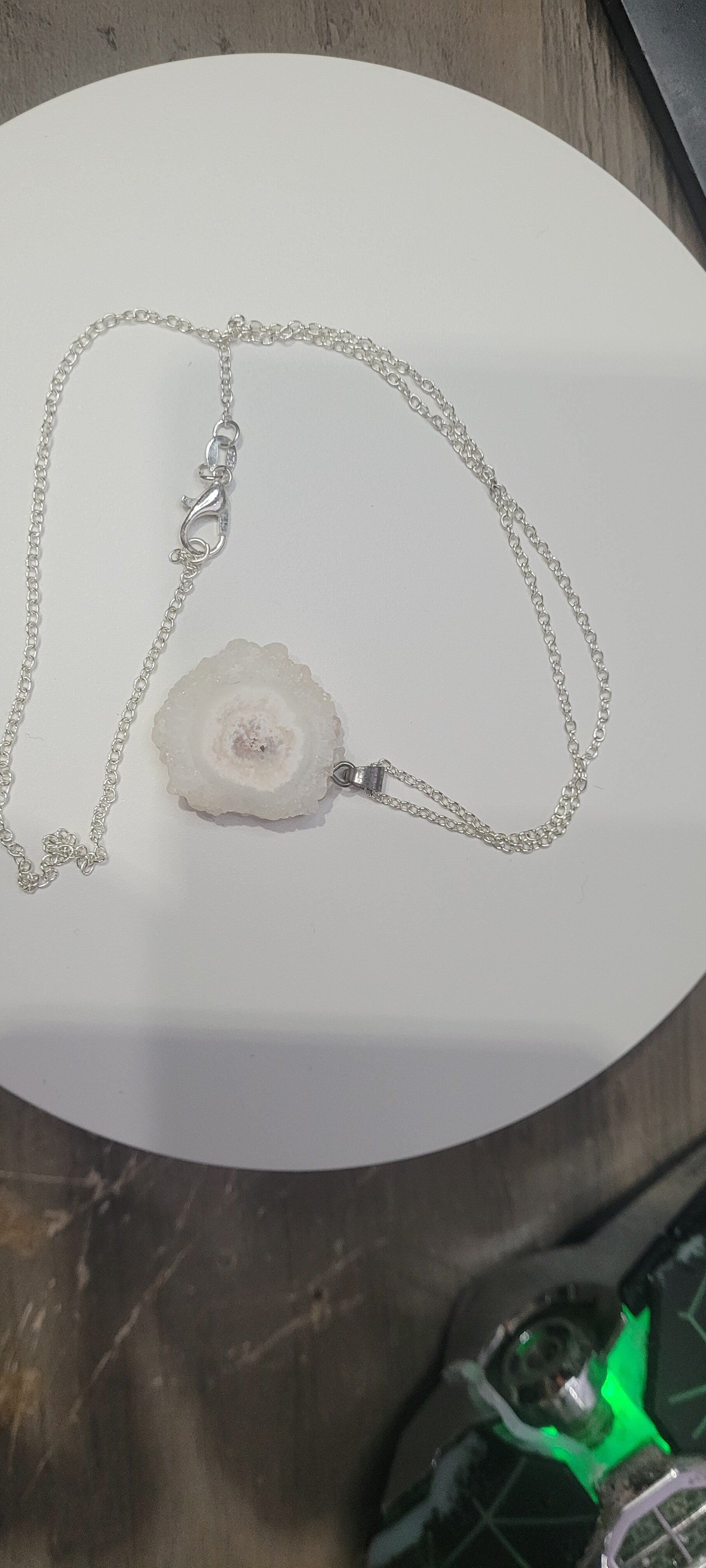 925 sterling silver plate chain with a genuine quartz stone slice.