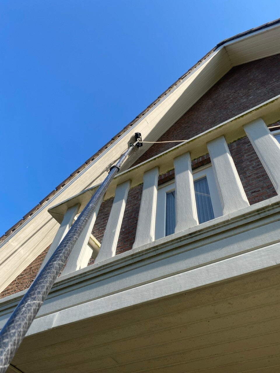 Dakkapel en overstekken reinigen in Asten