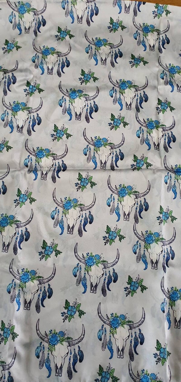 Blue skul with feathers