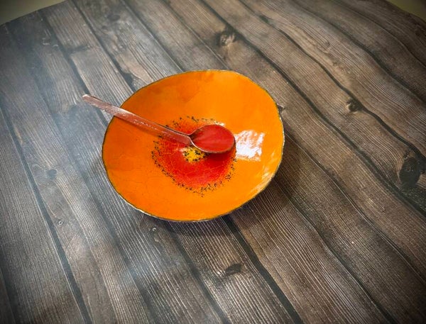 Orange salt cellar w/spoon