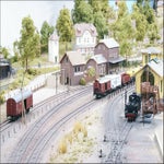 Modellbahn_EKW-mit-laternen-Weinert_Lokschuppen_Kohlebansen_Dampflok_Gterschuppen_Bahnhof_DSC03426_982px_Modellbahnanlage.jpg