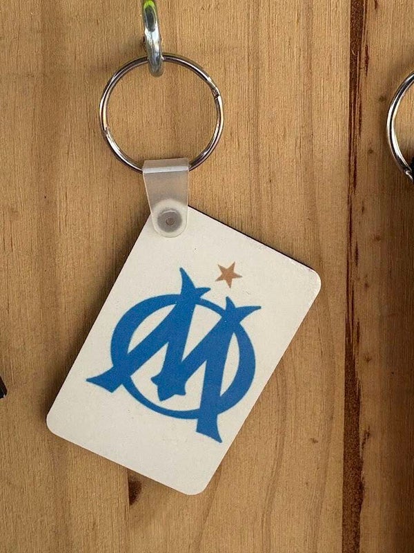 Porte clès double face OM
