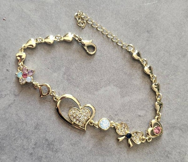 Bracelet fantaisie cœur et breloques