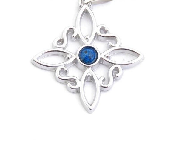 COLGANTE NUDO DE BRUJA EN ACERO INOXIDABLE CON PIEDRA DE APATITA 31 X 28 MM