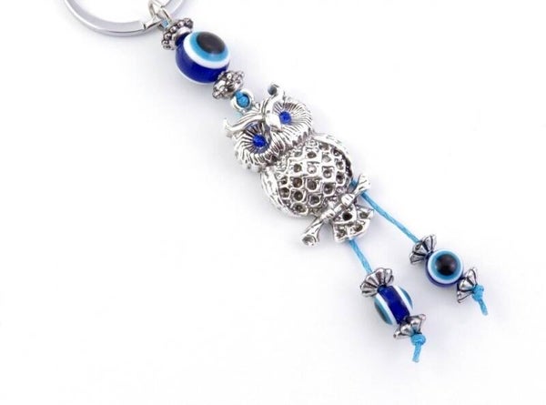 LLAVERO DE BISUTERÍA DE METAL CON AMULETO DE OJO TURCO  0