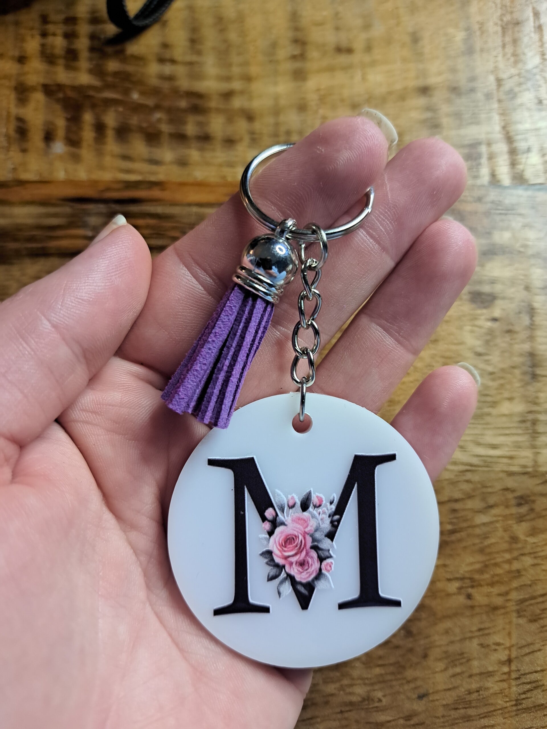 Witte sleutelhanger met letter