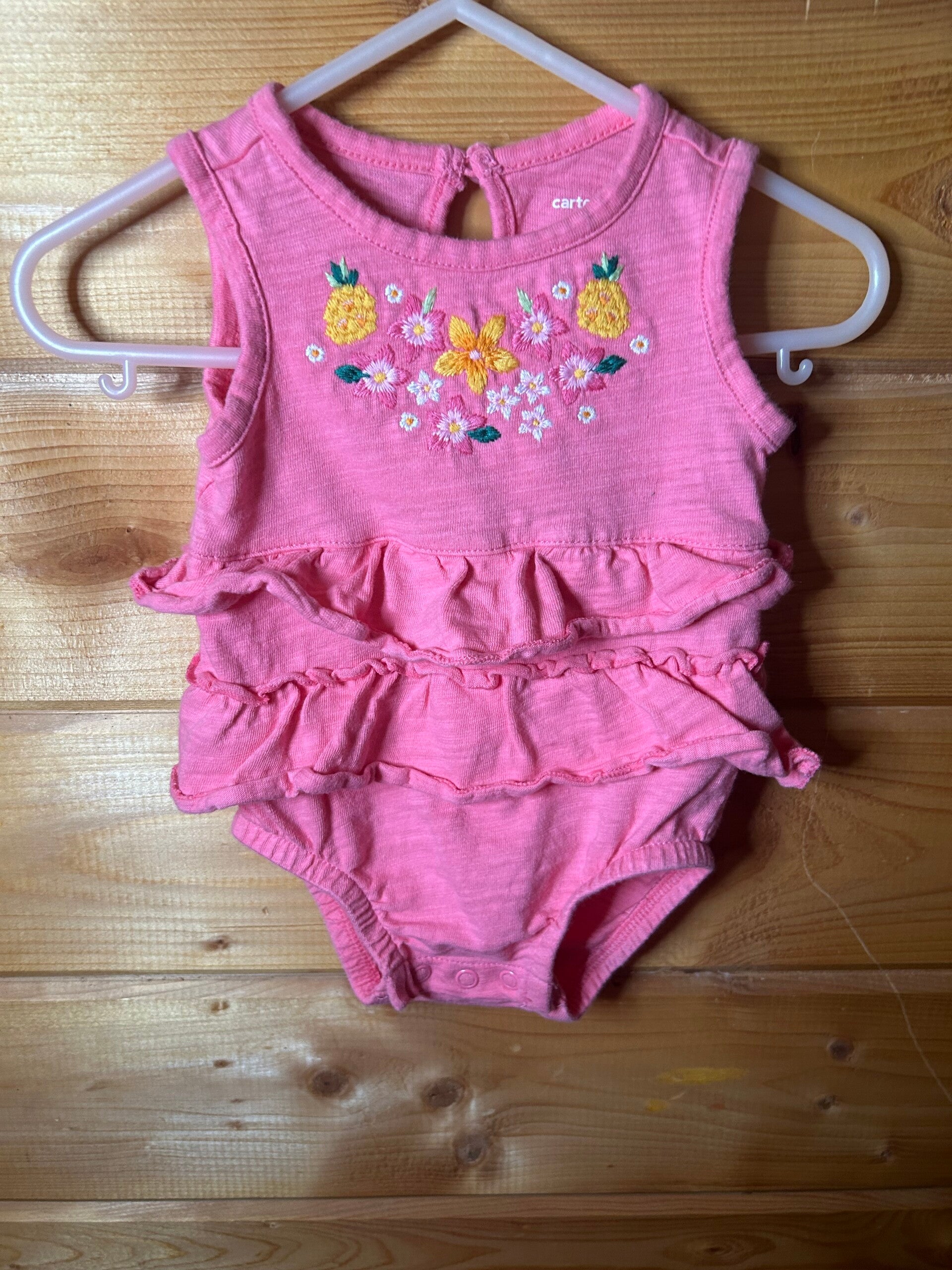 Carter’s pink ruffle romper