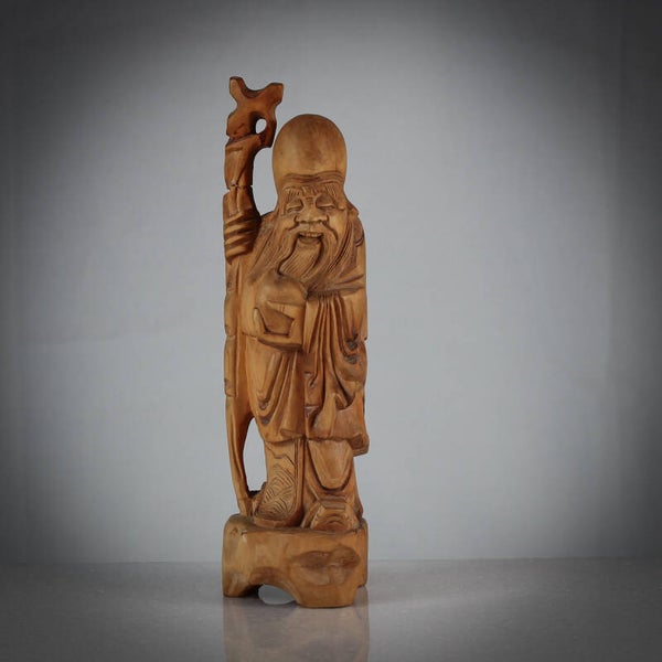 Handgesneden houten beeldje van Shouxing (ook bekend als Shoulao), de Chinese god van de levensduur.