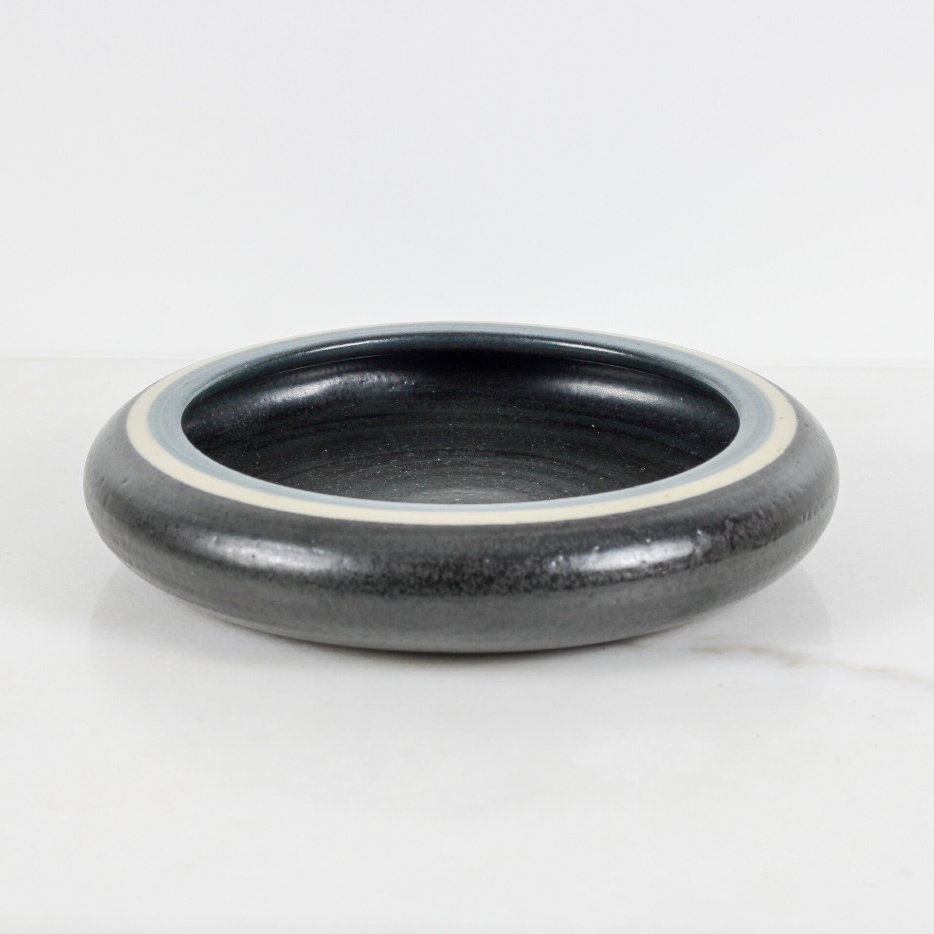 Mobach platte schaal, Piet Knepper