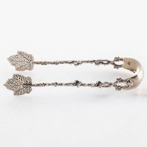 Floraals Meesterschap in Zilver: Een Verfijnde Suikertang door H. Hooykaas (1966)