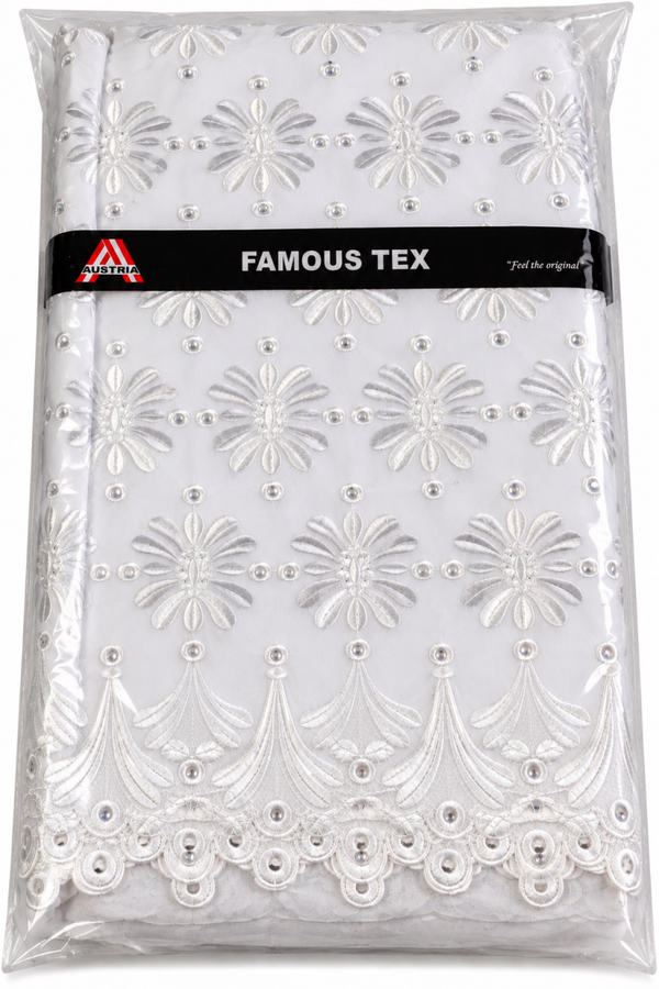 Tissu brodé blanc