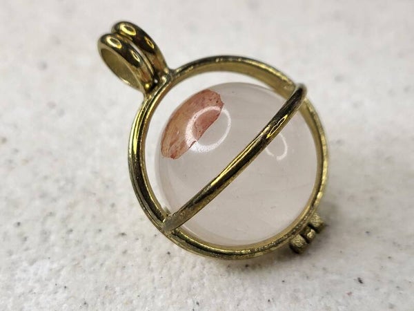 Wissselhanger goudkleurig met bergkristal