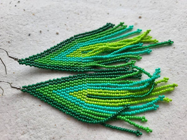 Native kraaltjes oorbellen