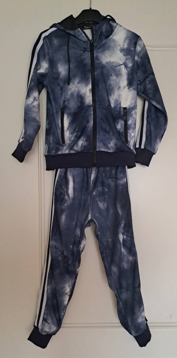 DE LAATSTE! Trainingspak lang blauw, wit gevlekt