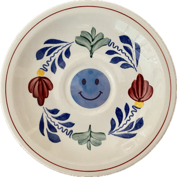 Smiley op boerenbont schotel