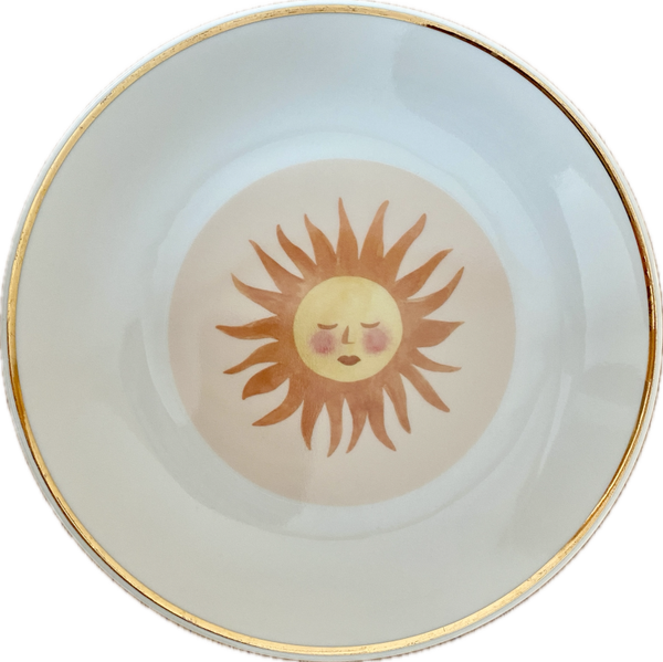 Zon op bordje met gouden rand