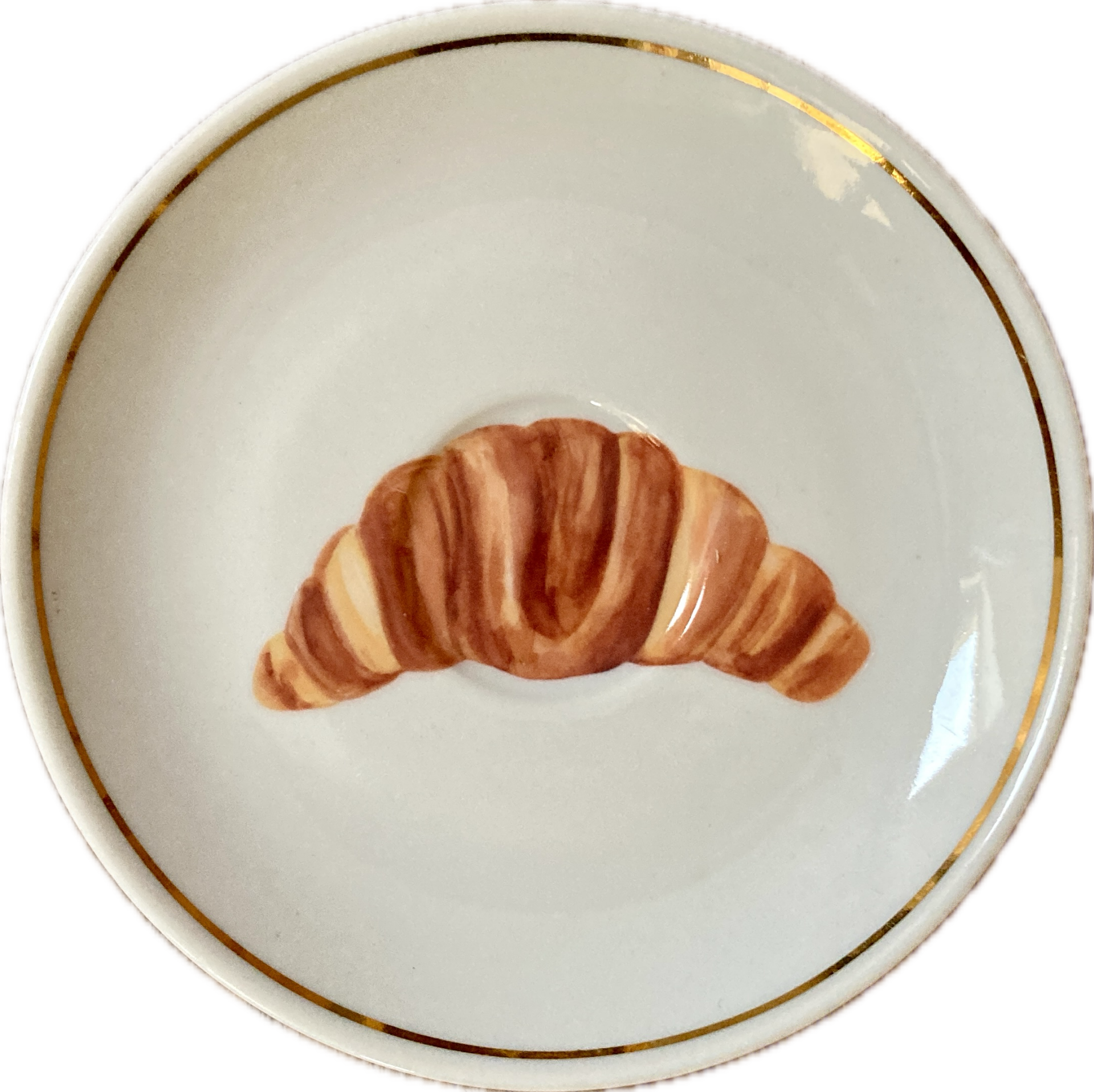 Croissant op schotel met goud randje