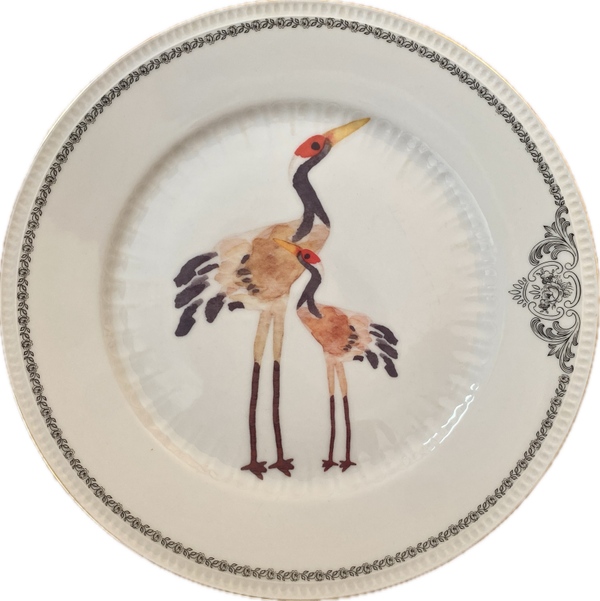 Kraanvogels op bord