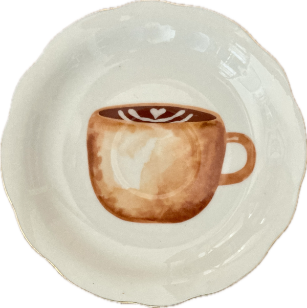 Koffie op schotel met gouden rand