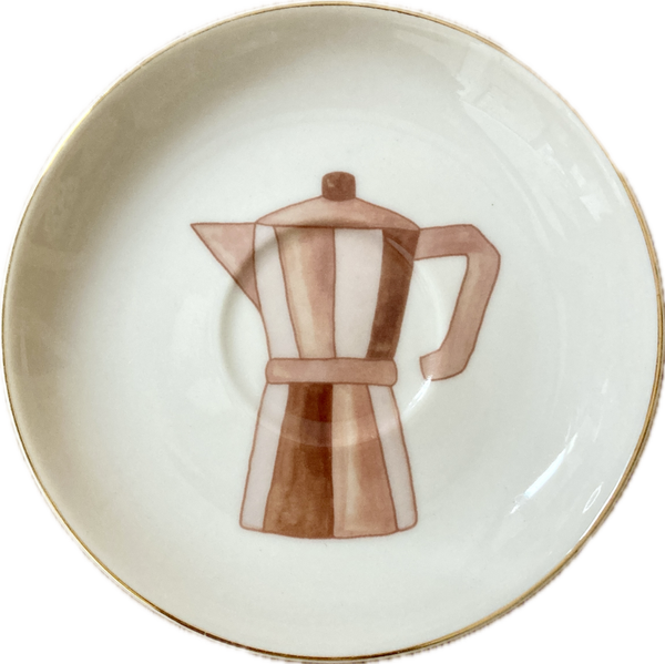 Moka pot op schotel met gouden rand