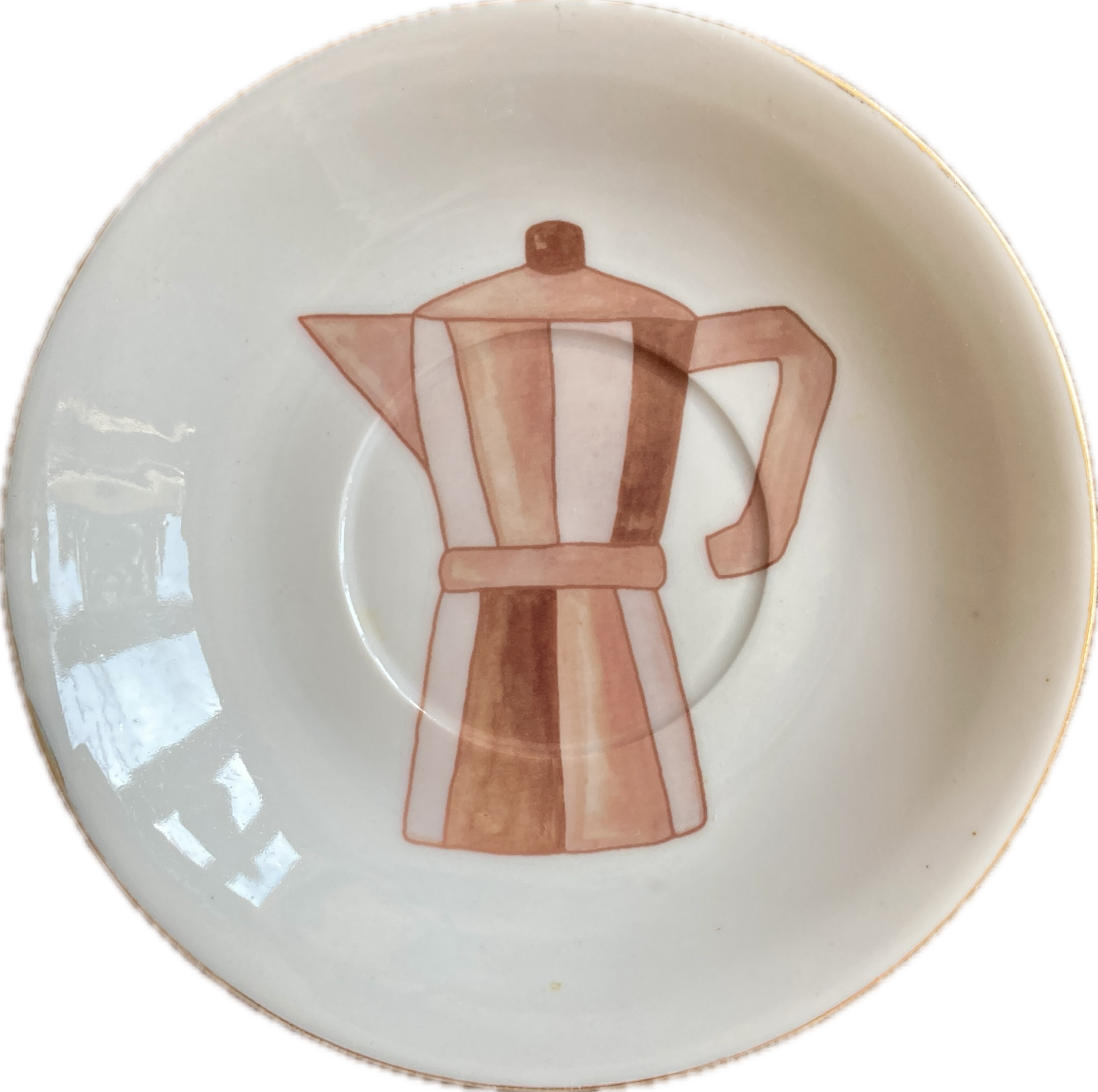Moka pot op schotel met gouden rand