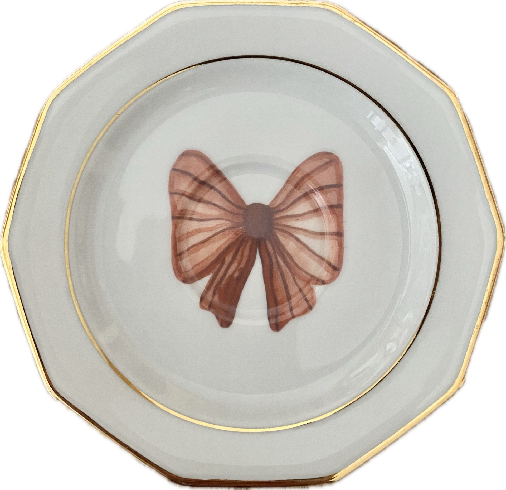 Strik op schotel met gouden rand